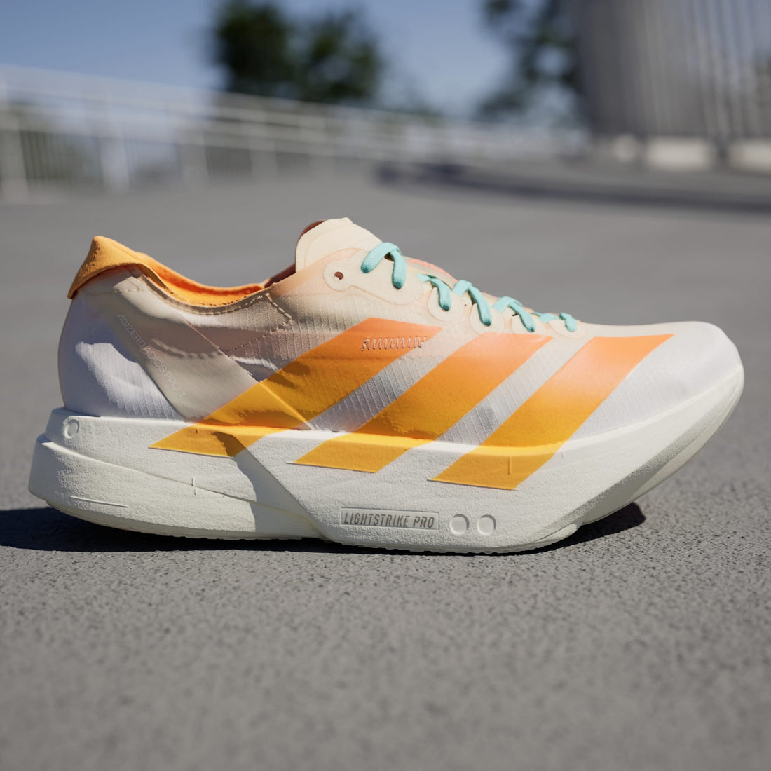 Tênis Feminino adidas Adizero Adios Pro 4 Crystal Sand / Flash Orange - JR1241 - Vista Lateral