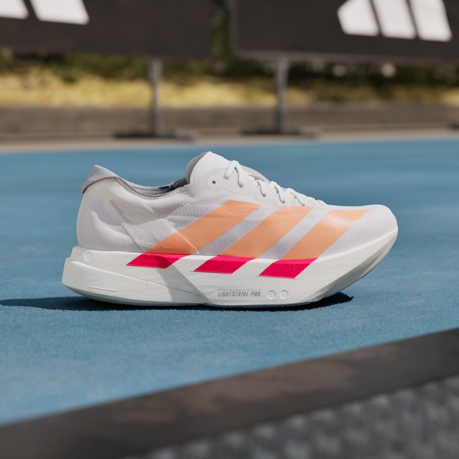Tênis Feminino adidas Adizero Adios Pro 4 Cloud White / Beam Orange - JR7087 - Vista Sola